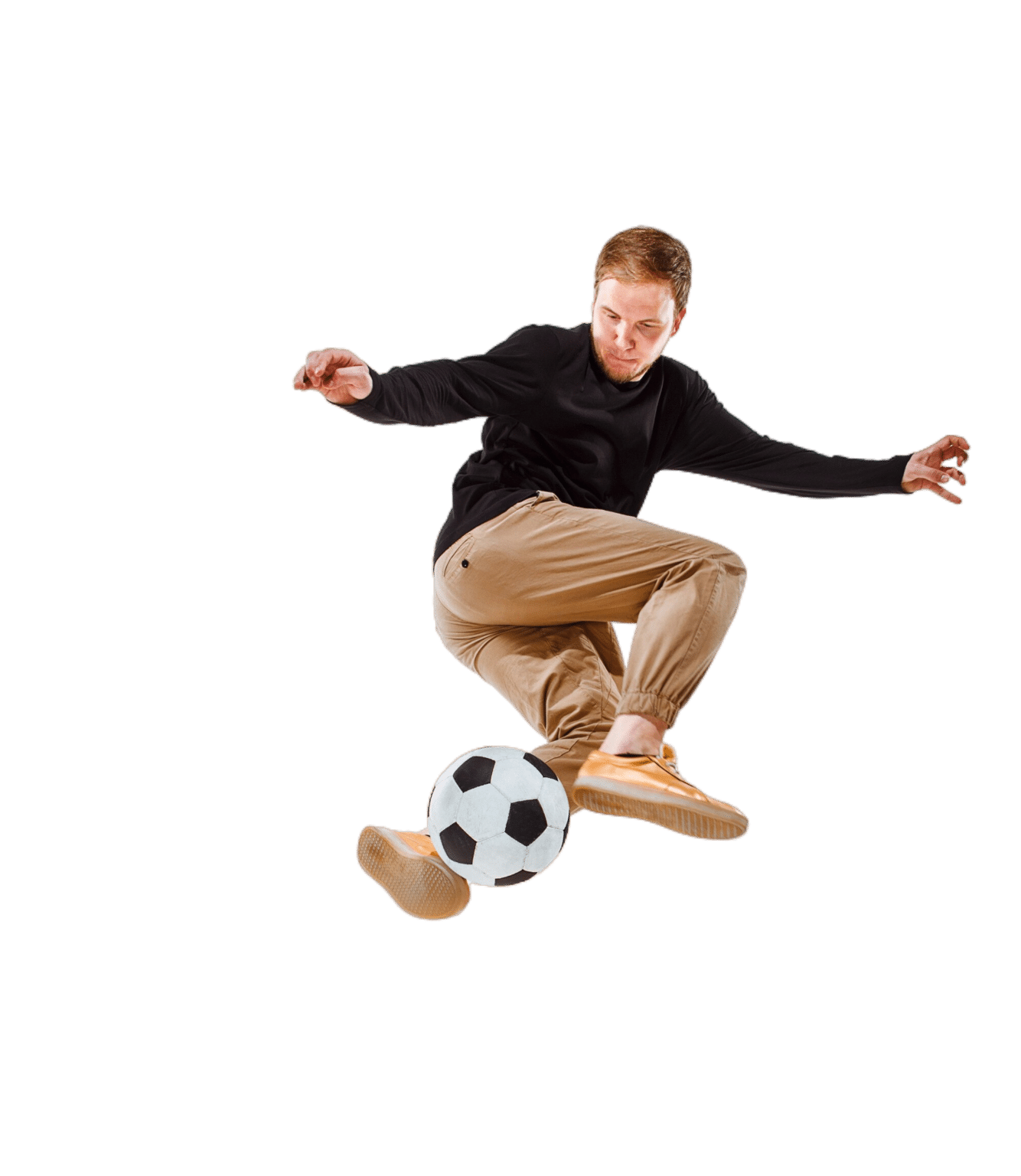 Joueur de football réalisant une figure acrobatique avec un ballon.