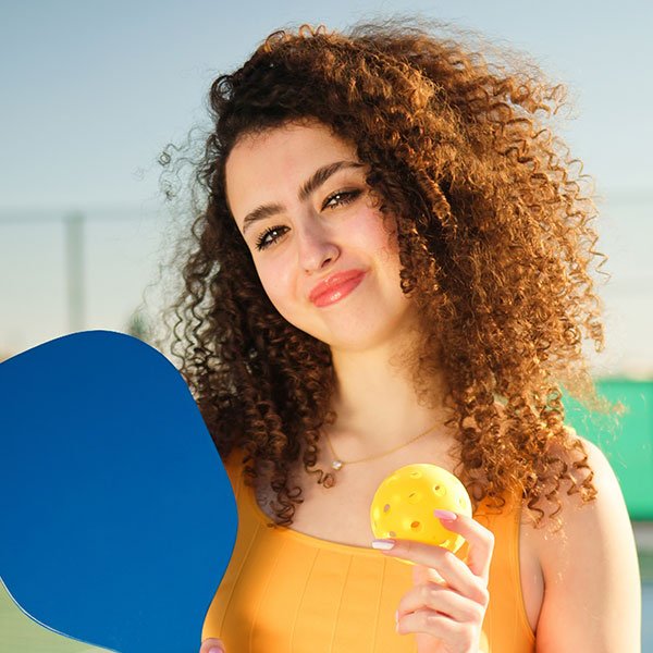 portait of a young happy and smiling curly jpg sport factory