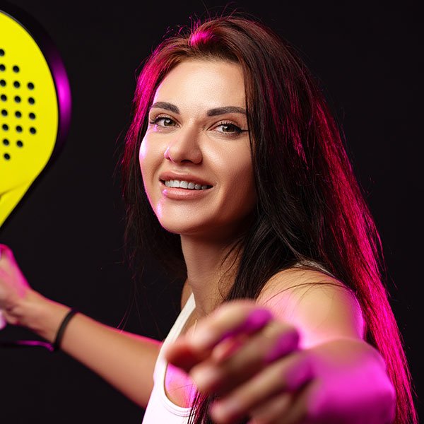 smiling woman prepares to serve jpg sport factory